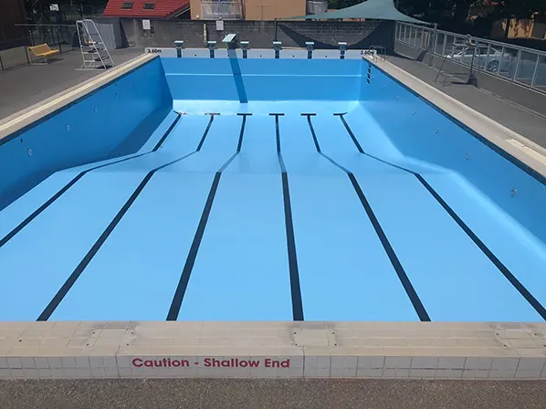 commercial swimming pool repainting img - Home